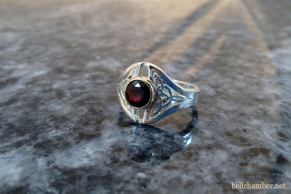 Bailey Celtic Ring in Silver with 6.5mm Red Garnet