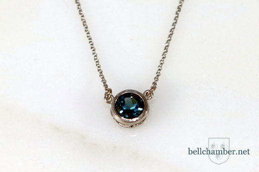 Platinum Chain and Bezel with Blue Topaz
